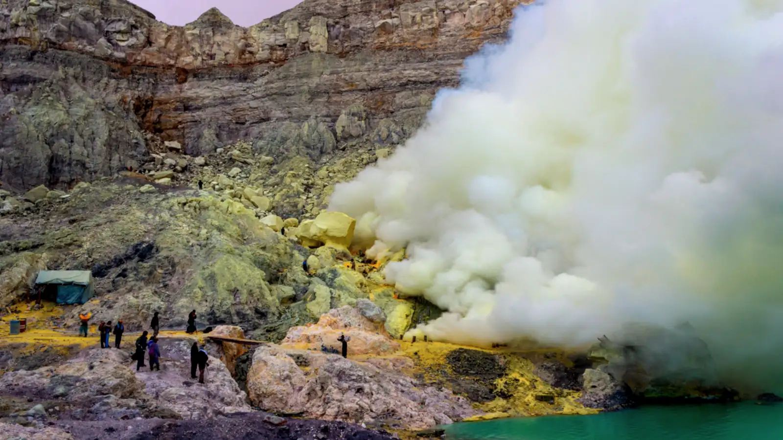 Smartphone Photography at Ijen Crater Photographer capturing the electric blue fire at Ijen Crater with a protected smartphone