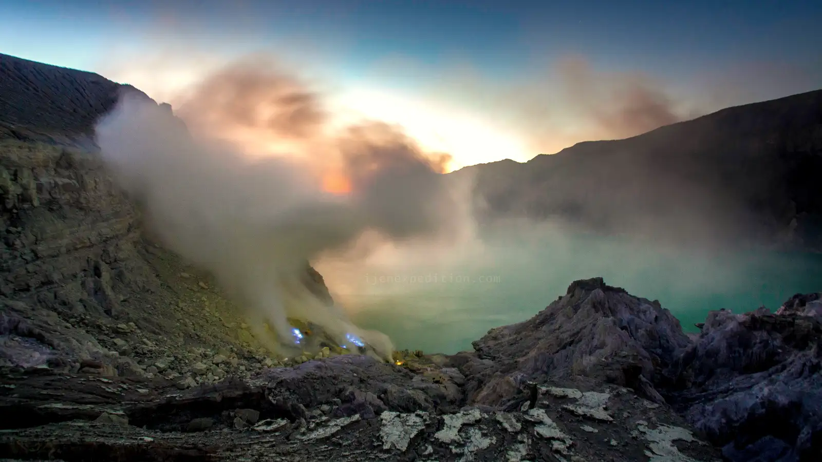 Ijen Crater Turquoise Lake Morning View Stunning view of the acidic turquoise lake at Ijen Crater during a morning hike from a Banyuwangi basecamp