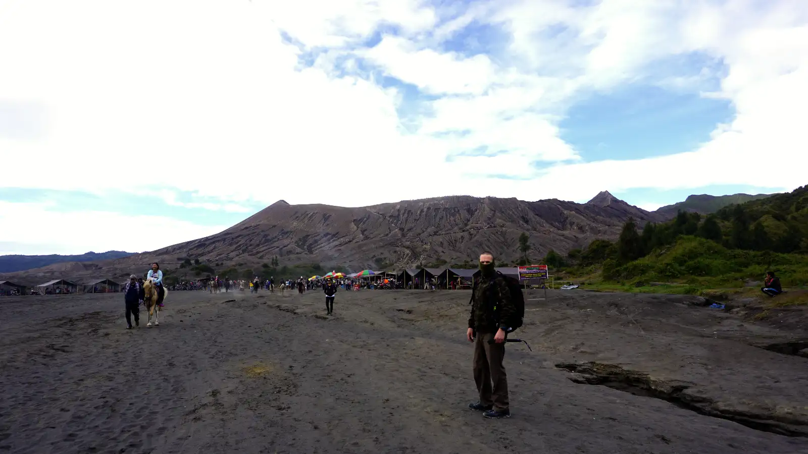 Sunrise over Mount Bromo caldera with Sea of Sand and surrounding peaks