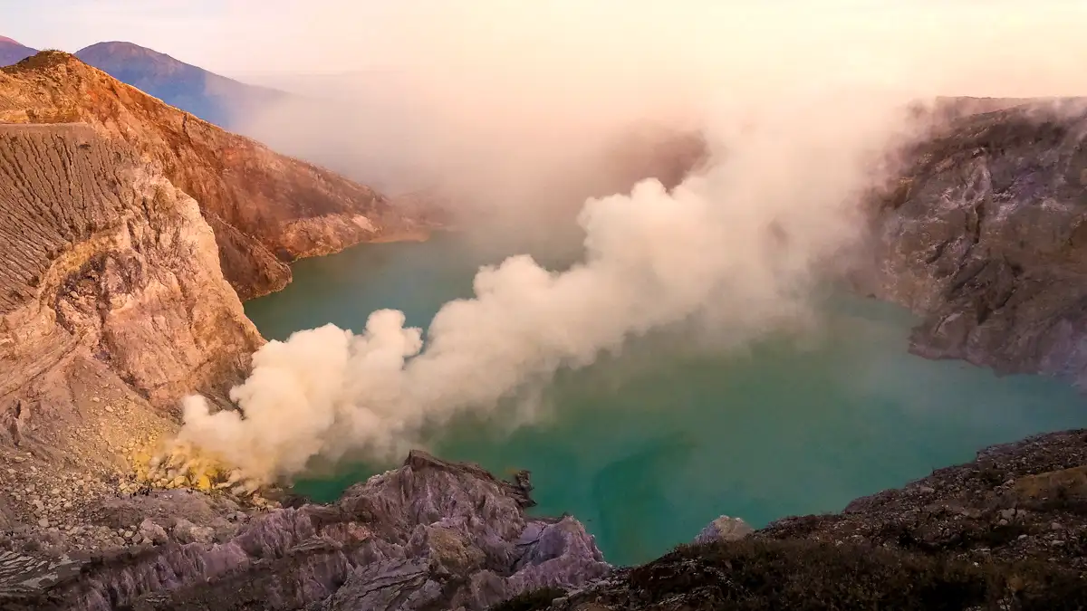 Active Sulfur Vents of Kawah Ijen Sulfur vents and miners in the Ijen volcanic landscape